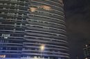 A fire burns on a tower balcoy