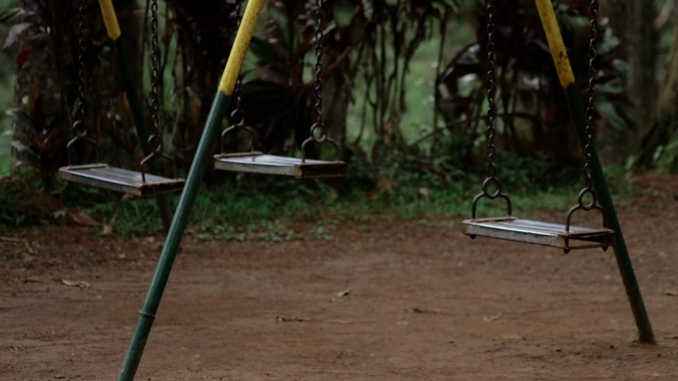 A set of swings in disrepair