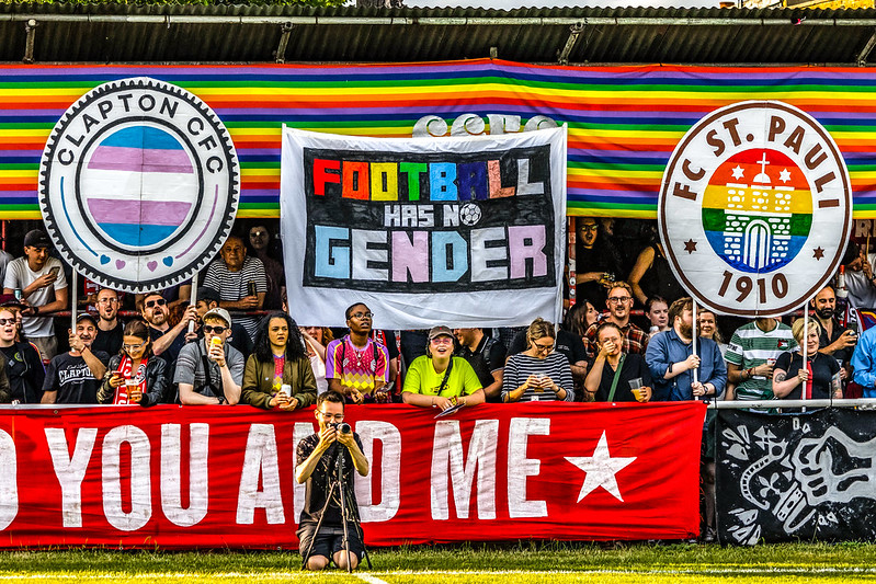 Football fans with a banner reading 'football has no gender'