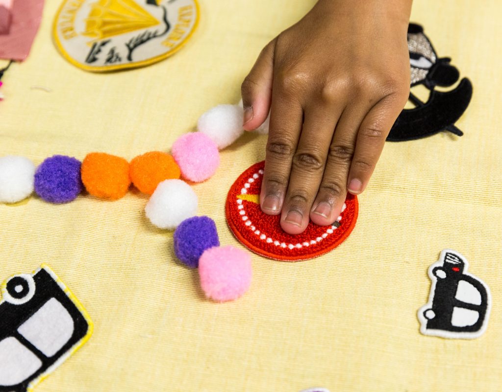 A person does a craft activity