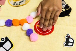 A person does a craft activity