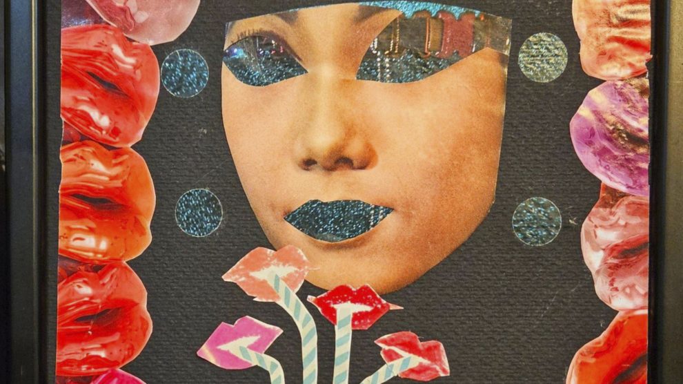A mixed media collage of a face