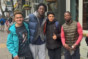 Young men pose for the camera