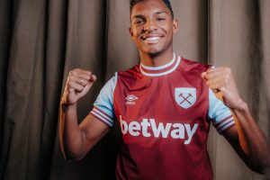 A person wears the new West Ham home kit