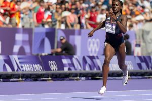 An athlete taking part in a relay race