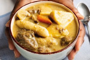 The cover of the book Cooking Connections: hands holding a bowl of food