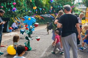 Children and adults enjoy outdoor play
