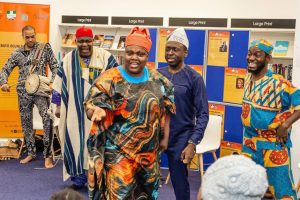 people wearing clothes in a Nigerian style