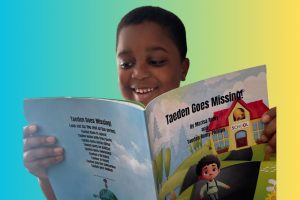 A young person holds open a book