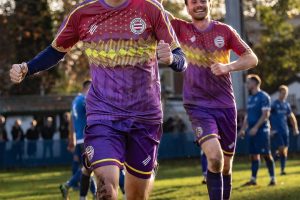 players of Clapton CFC Men’s First Team running in joy