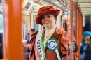 a lady standing in Suffragette Line tube