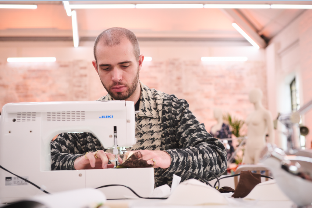 Daylan Mollentze sewing