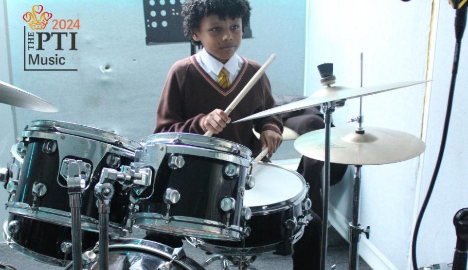 Music student playing the drums