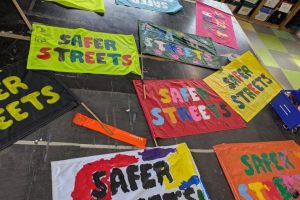 Coloured banners promoting Safer Streets
