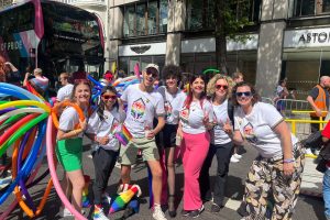A group of people on a Pride march