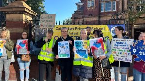 Parents and staff protest outside Newham Town Hall against the proposed closure of Calverton Primary School (credit Louise O'Shea)