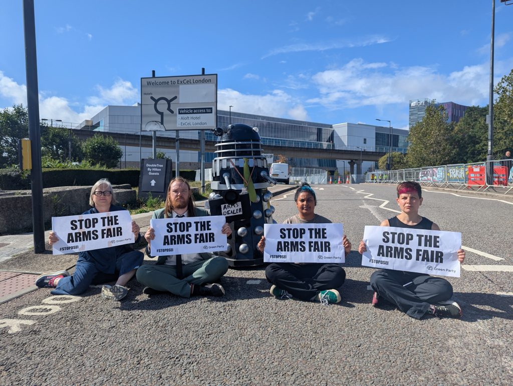 Green Party assembly members protesting against the DSEI arms fair