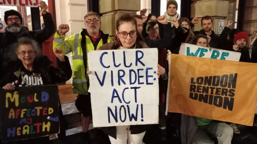 Shauni-Leigh Tyson (with "act now" placard) at the London Renters Union protest