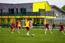 Young people playing football