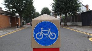 An LTN bollard with a cycling sign