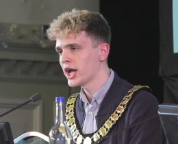 Green councillor Nate Higgins speaks at his first meeting as chair of Newham Council (credit Newham Council)