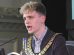 Green councillor Nate Higgins speaks at his first meeting as chair of Newham Council (credit Newham Council)