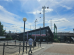 A restaurant with a paved walkway in the foreground